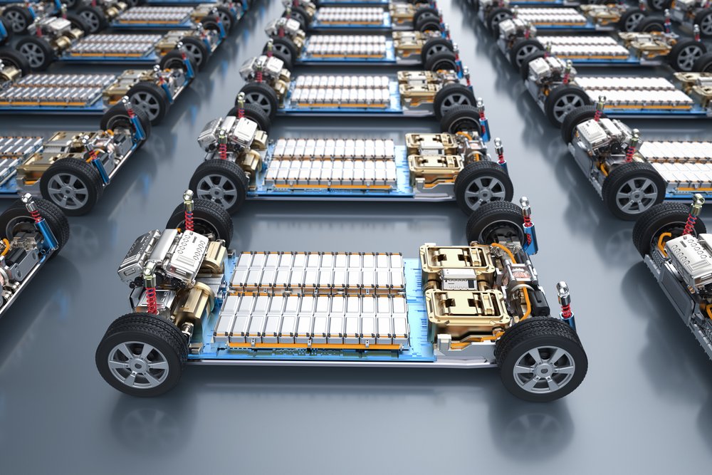 Group of electric cars with pack of battery cells module on platform 3d rendering group of electric cars with pack of battery cells module on platform in a row